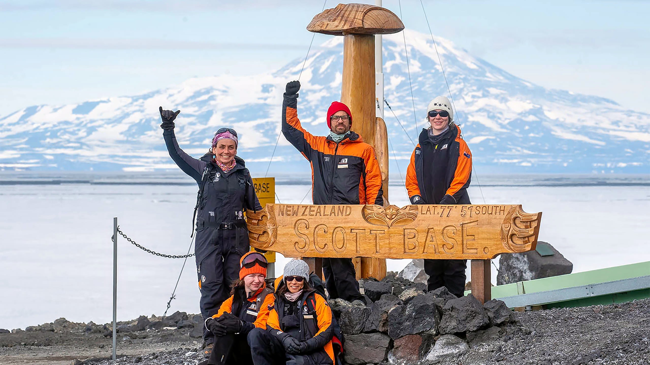 At Scott Base, from left, guide Bia Boucinhas, Katie Gilchrist on the ground next to Australian researcher Sandra Rodrigues, James Muirhead and Zoe Armstrong. 