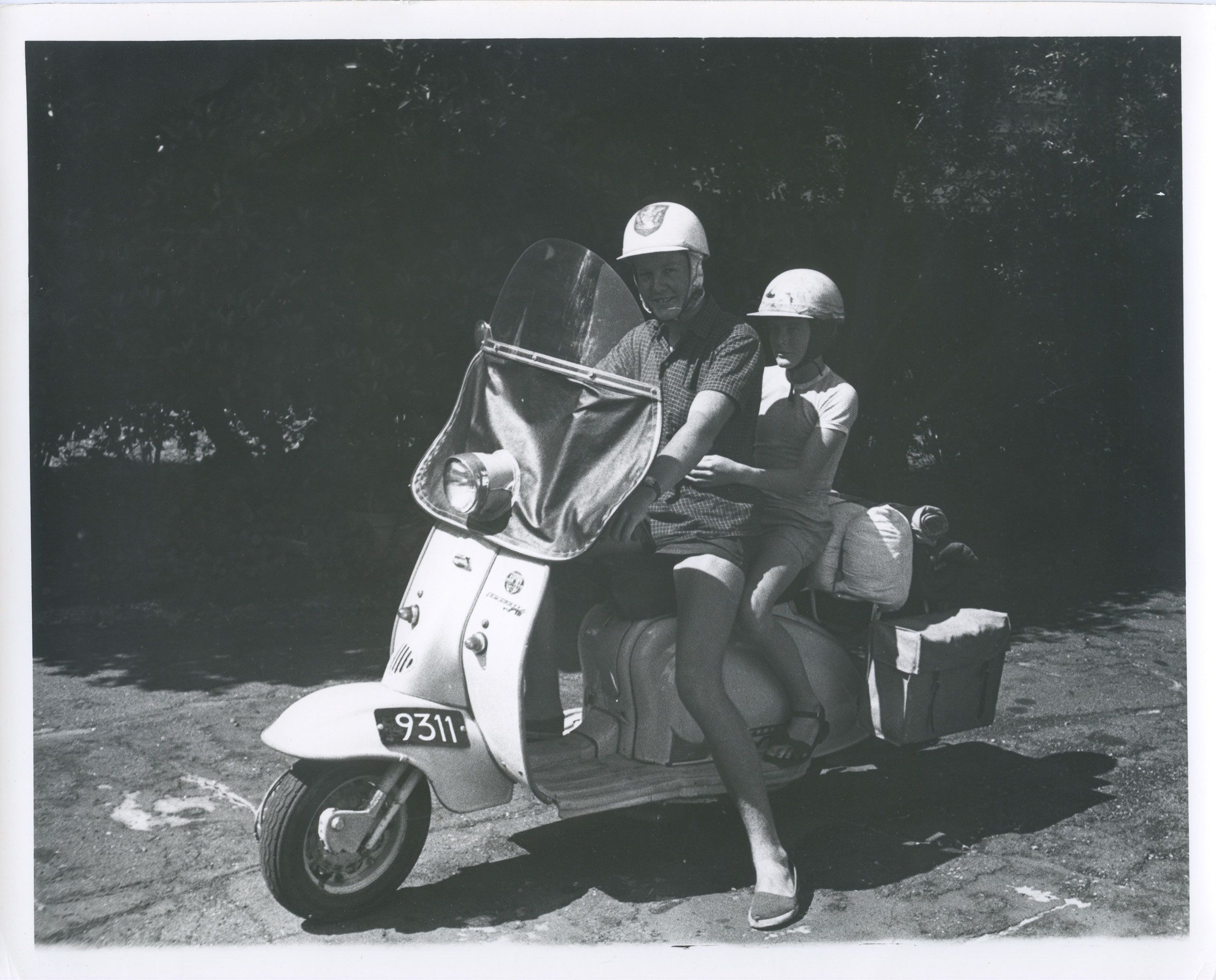 Follow curiosity: Ian and Peter Hunter off to camp in Huia on their Lambretta scooter.