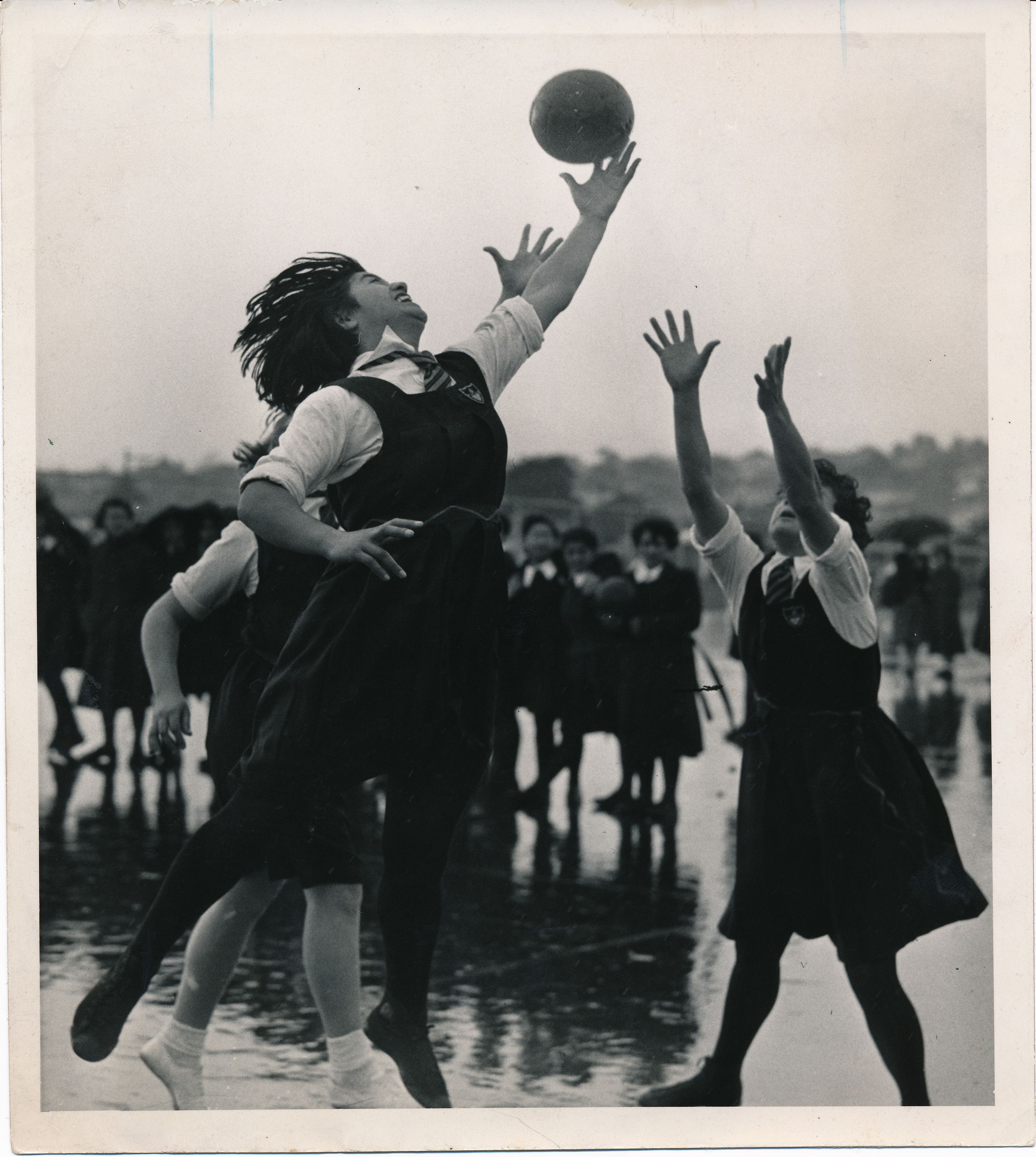 Netballers wearing the famous woollen tunics, circa 1950s. 